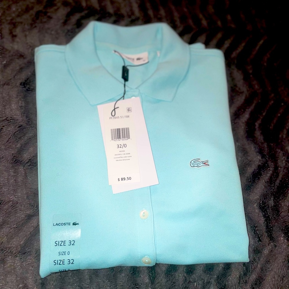 Women’s Light Blue Lacoste polo shirt sleeve shirt.